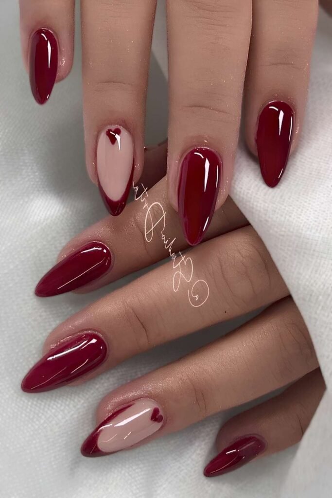 2. Burgundy French Tips with Tiny Red Hearts