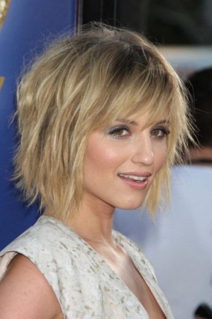 20. Messy Layered Cut with Side-Swept Bangs