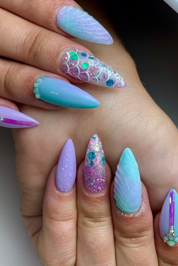 20. Pearl White and Sky Blue Hibiscus Nails