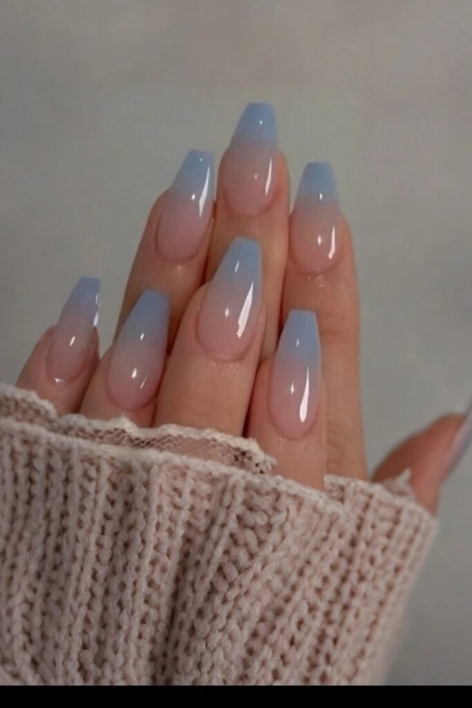 3. Powder Blue Nails with White Leaf Accents