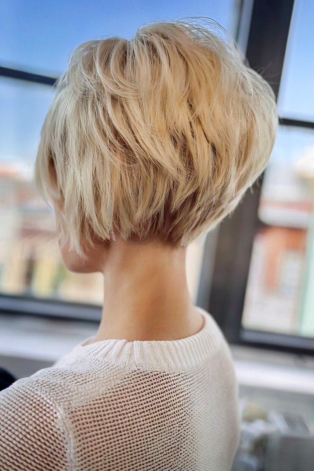 3. Voluminous Inverted Bob with a Silver Sheen
