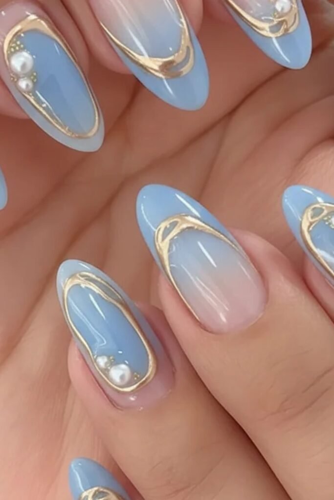 7. Baby Blue Short Nails with a Daisy Accent