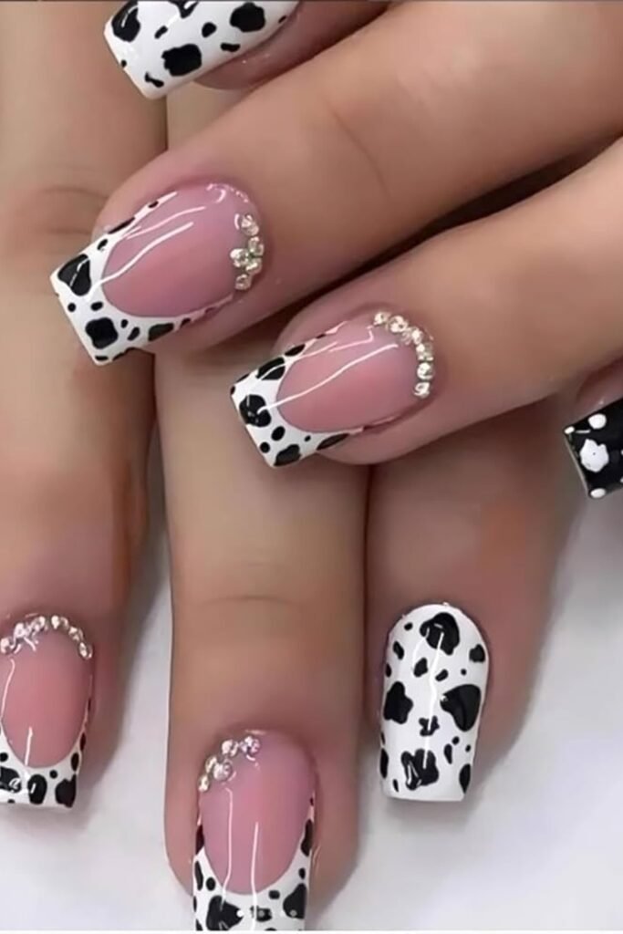 7. Cream and Black Abstract Cow Spots