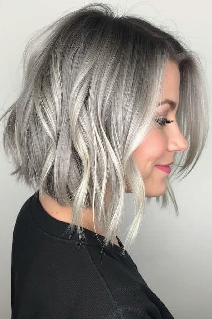 8. Ash Blonde Choppy Bob with Dark Smudged Roots