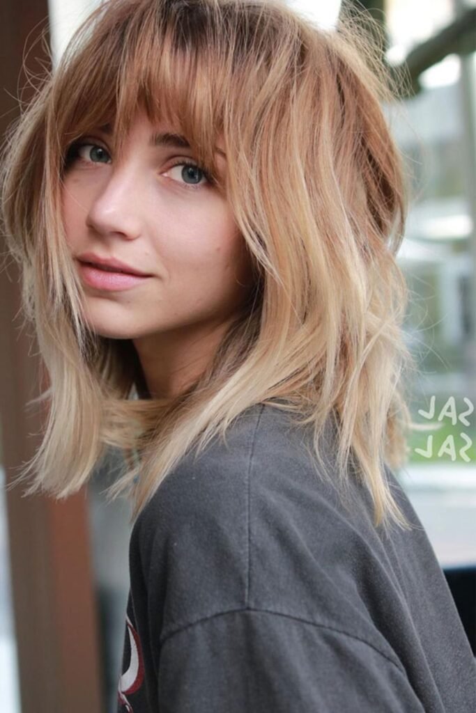 8. Soft Brunette Shag with Curtain Layers