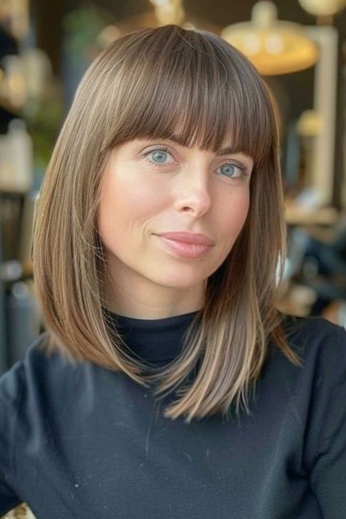9. Classic Straight Lob with Blunt-Cut Bangs