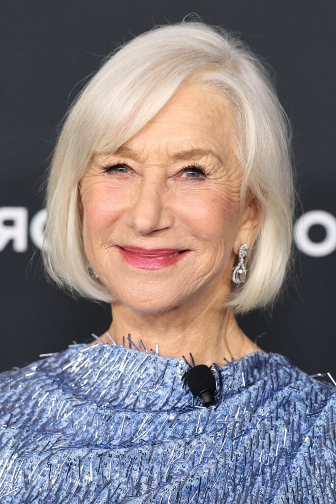 8. Classic White Bob with Side-Swept Bangs