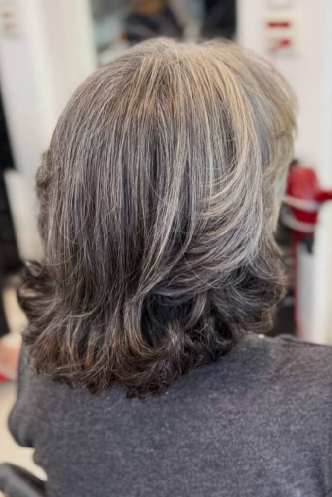 18. Layered Brunette Cut with Flipped Ends