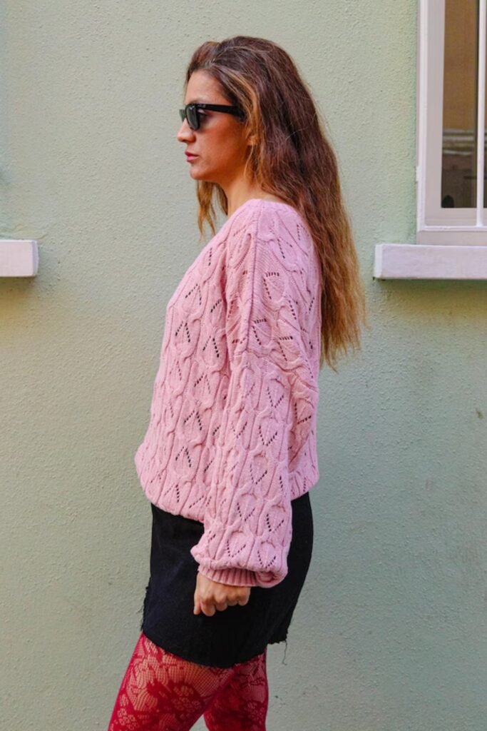 14. Pink Pointelle Sweater with Black Mini Skirt and Red Tights