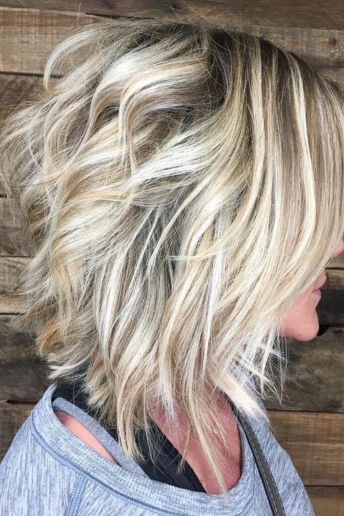 10. Champagne Blonde Voluminous Inverted Bob