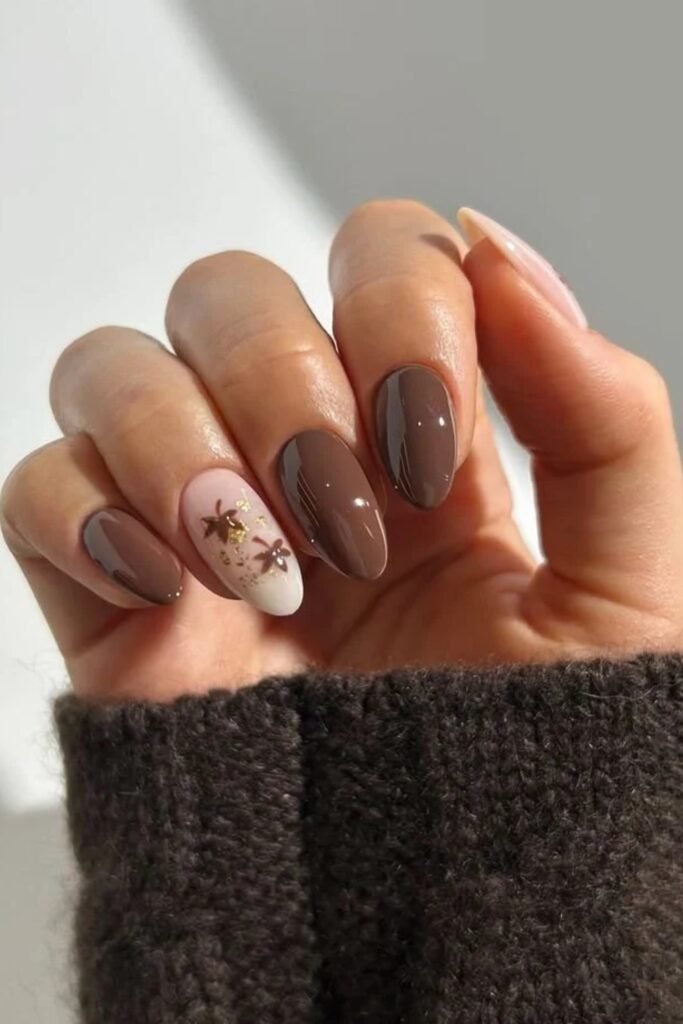 5. Mocha Brown Nails with Falling Leaf Accent