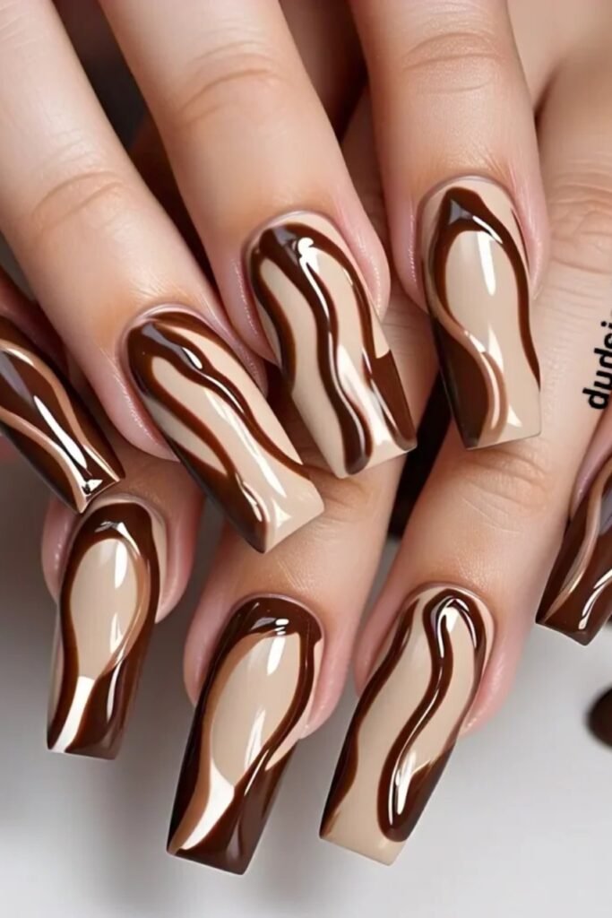 15. Latte Nude and Chocolate Liquid Swirl Nails