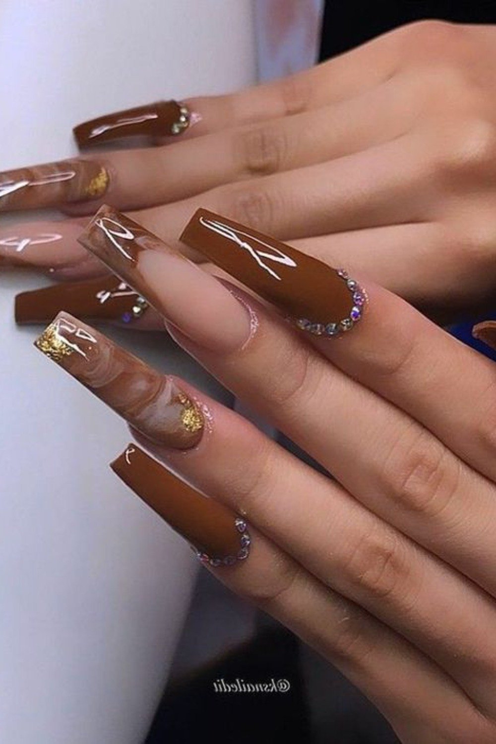 20. Caramel Coffin Nails with Gems and Gold Marble