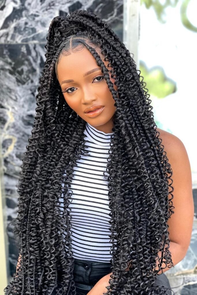 12. Long Boho Braids with a High Half-Up Style