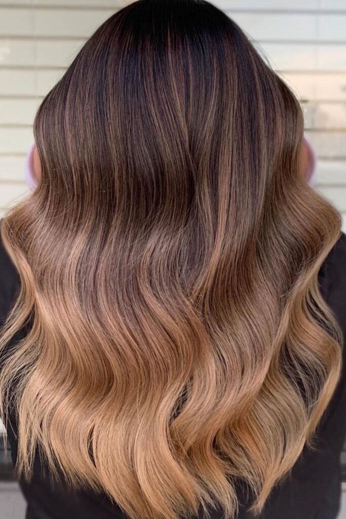 19. Golden Caramel Ombre on Long Waves