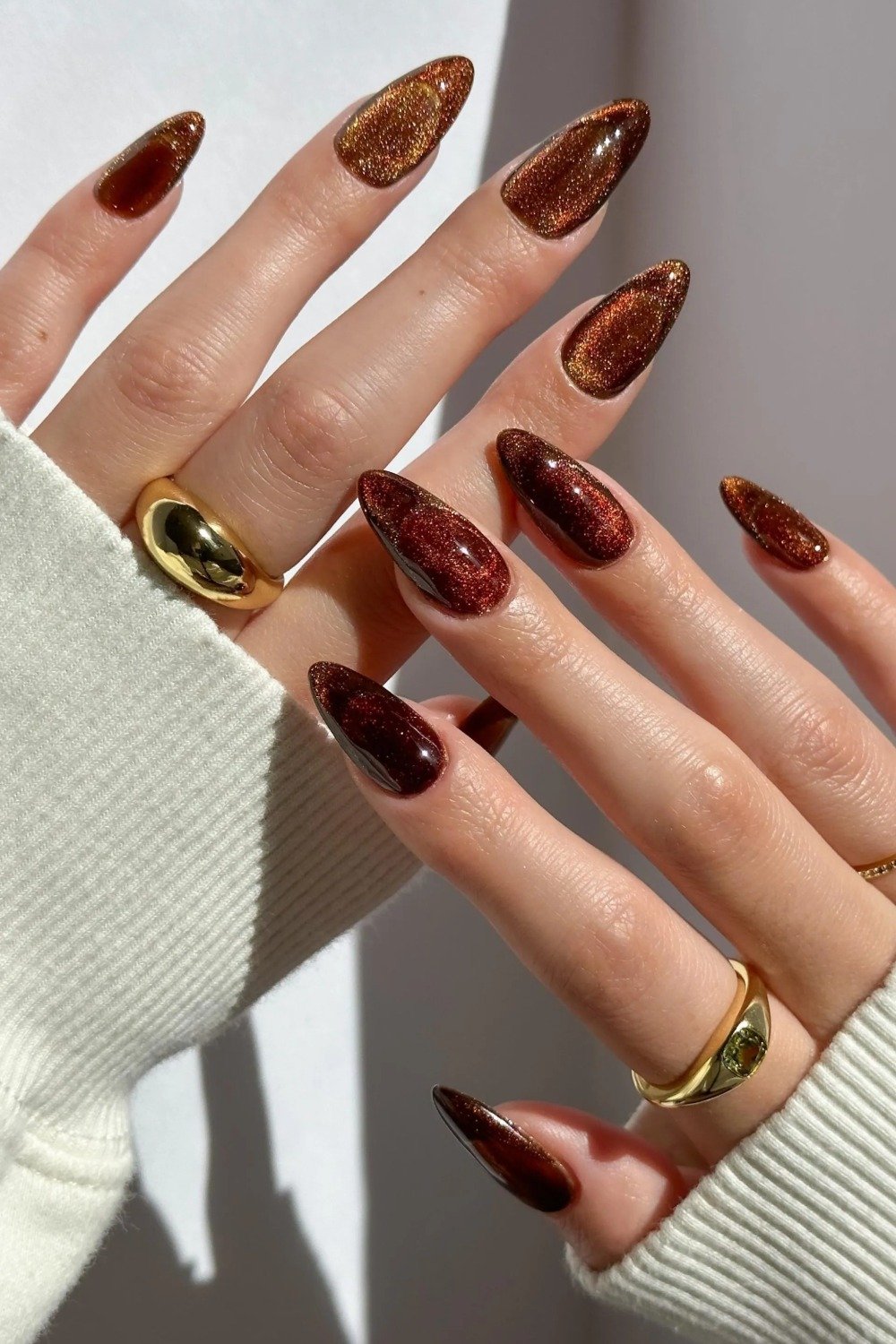 4. Copper Brown Cat-Eye Nails
