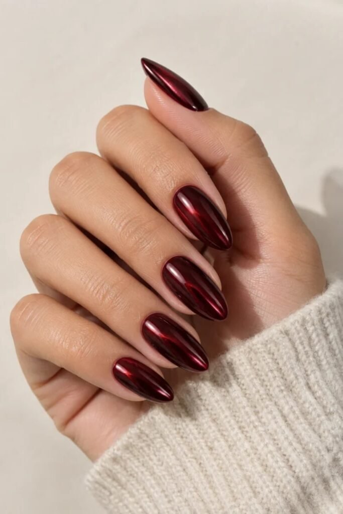8. Cherry Wine Chrome Nails