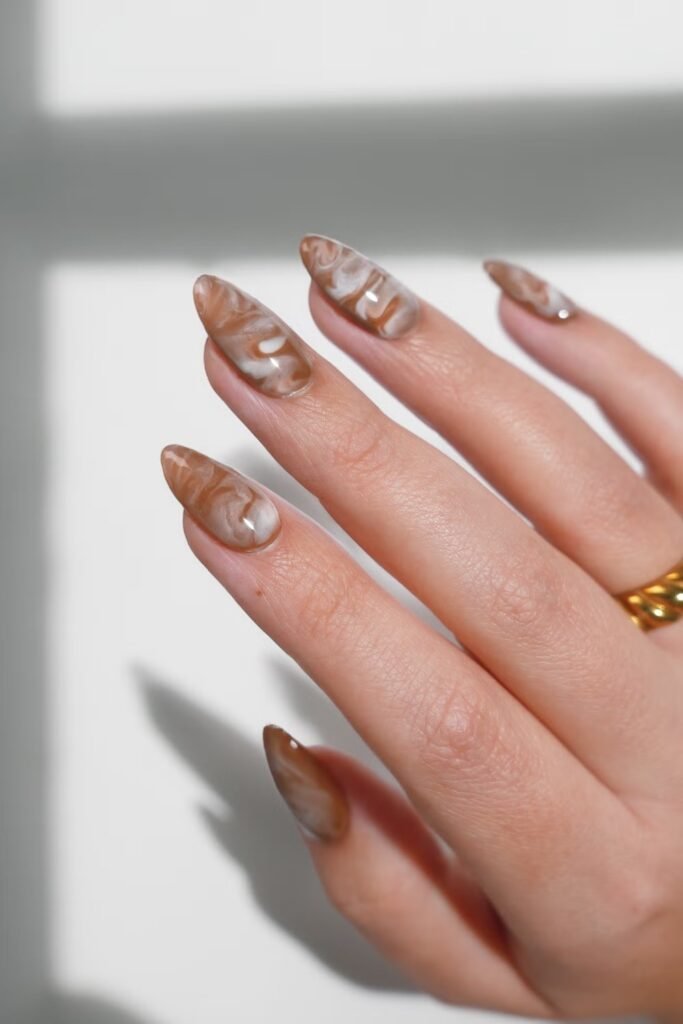 10. Caramel Latte Marble Swirl Nails