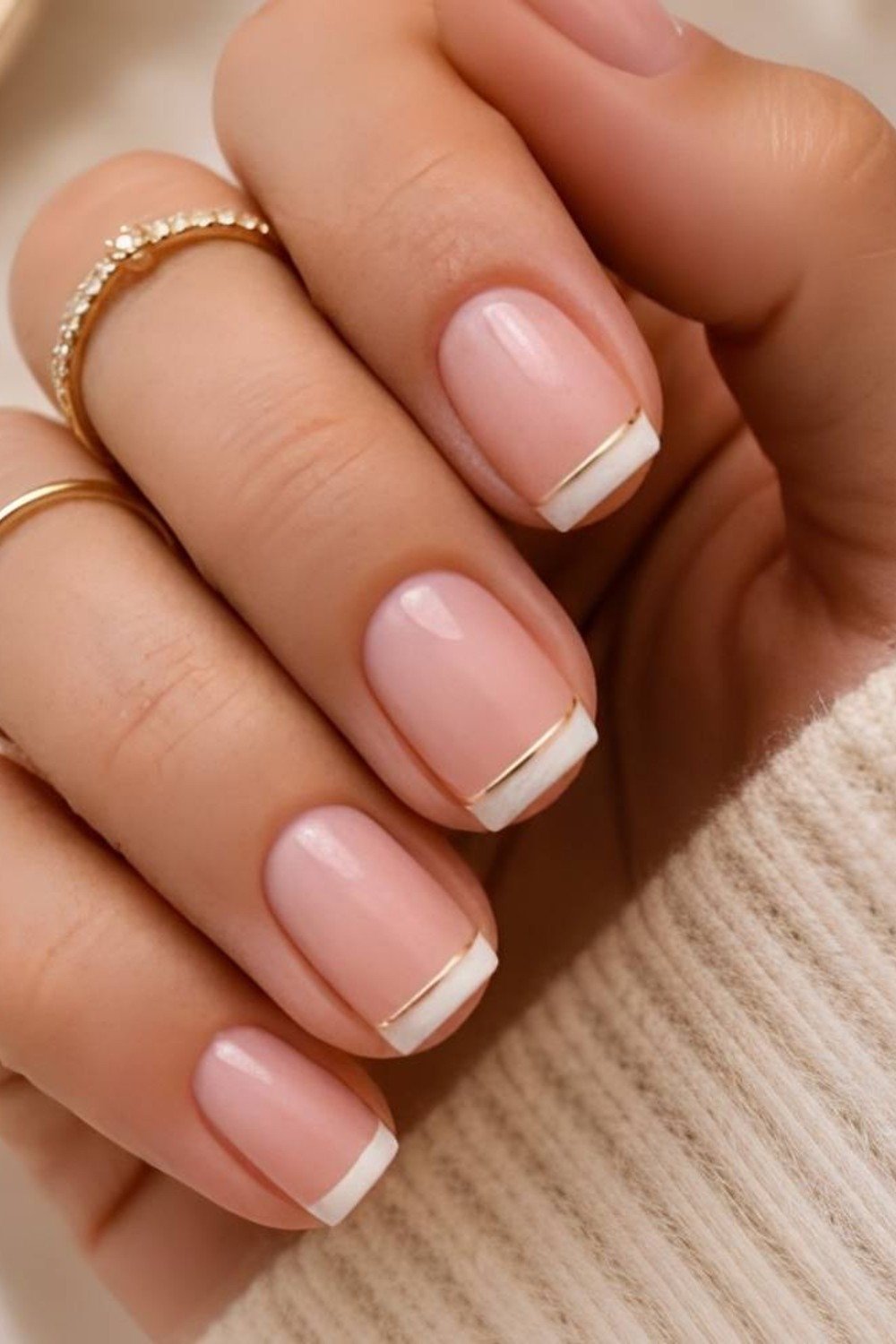 16. White French Tips with Gold Line