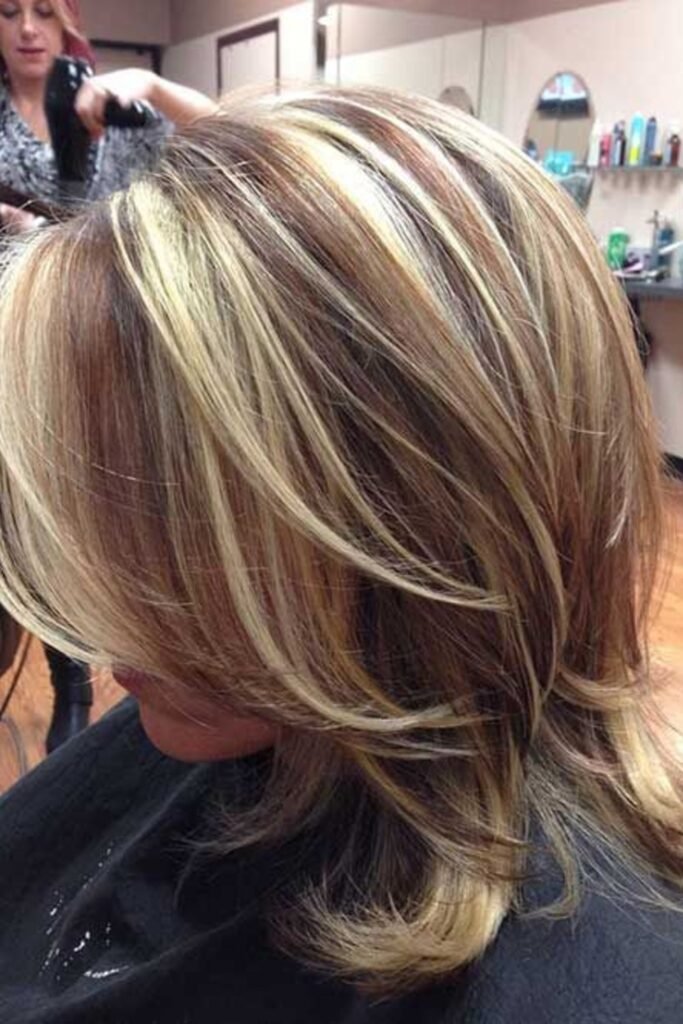 17. (Brown and Blonde Chunky Highlight Feathers)