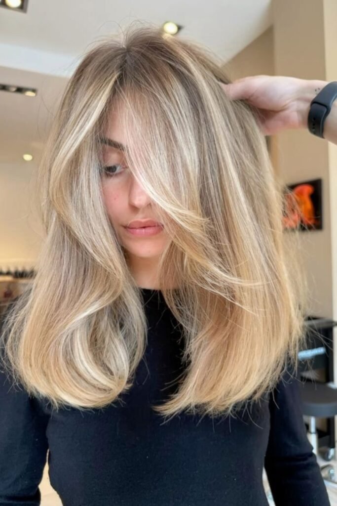 6. (Butter Blonde Face-Framing Layers)