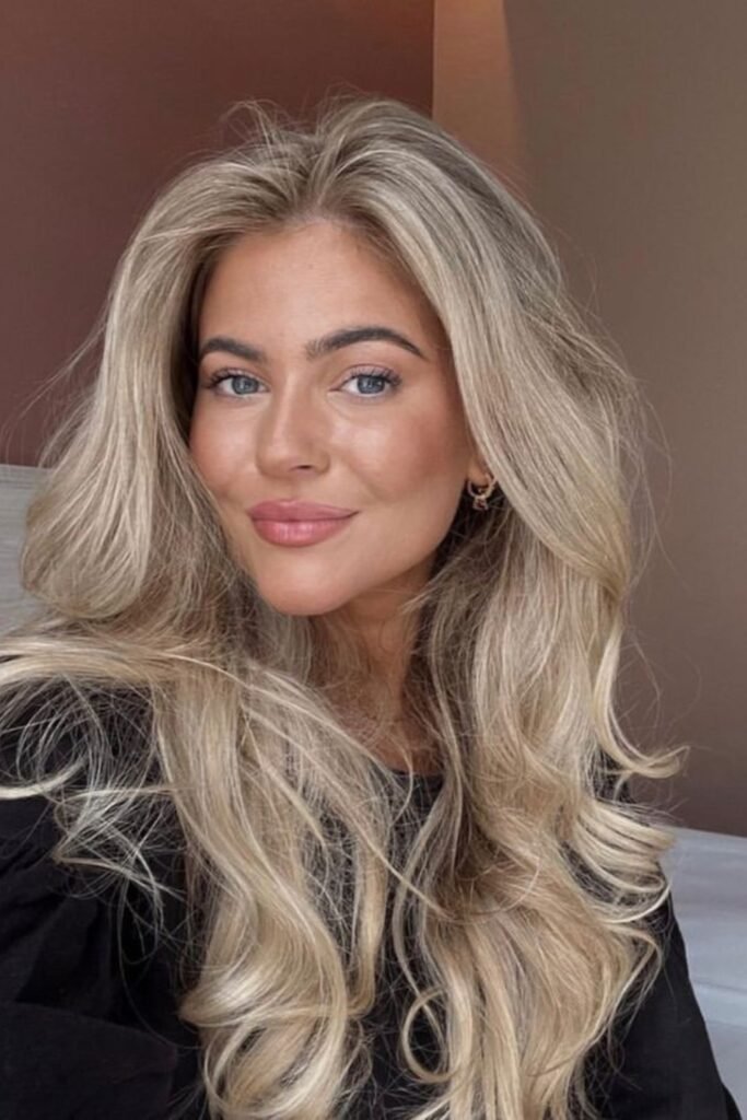 10. (Sandy Ash Blonde Voluminous Waves)