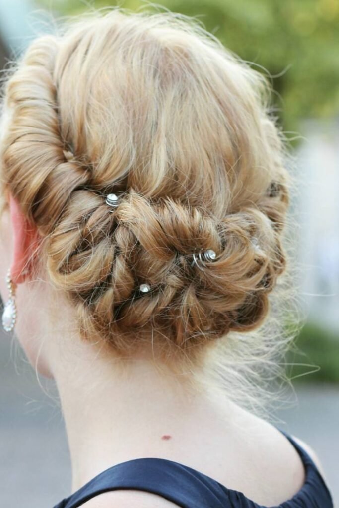5. (Twisted Rolled Updo with Crystal Pins)