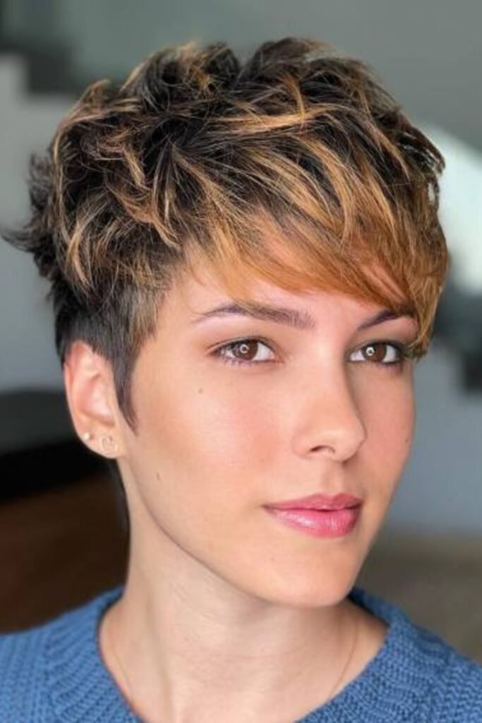 2. Caramel Highlighted Pixie with a Side Fringe