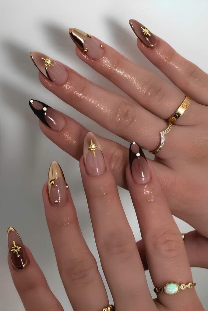8. Gold, Chocolate, and Starburst Charm Nails