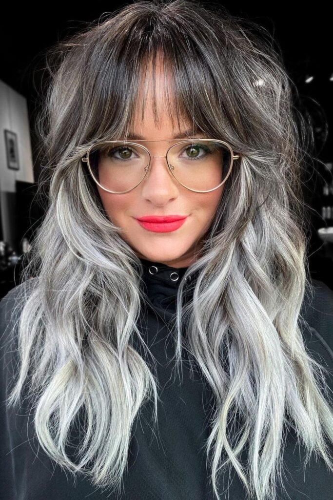 8. (Shaggy Layers with Bangs and Icy Silver Ends)