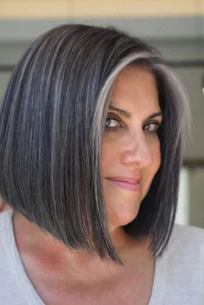 17. (Sleek Angled Bob with Silver Face Frame)