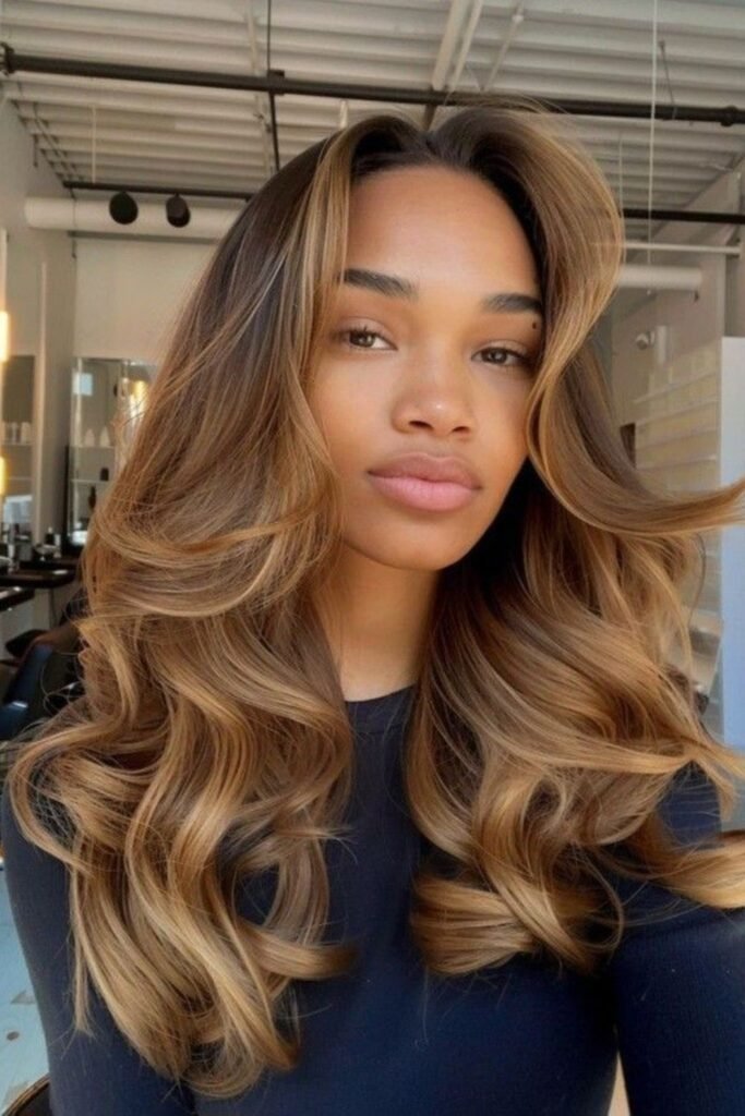 13. Golden Caramel Brown with a Bouncy Blowout
