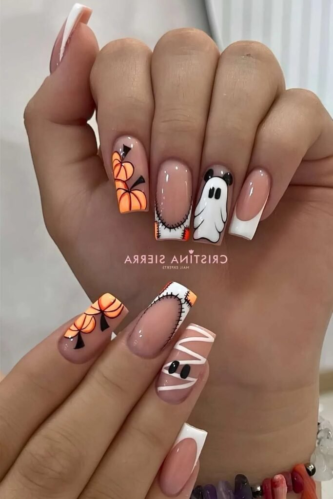 7. Pumpkin, Ghost, and Mummy French Tips
