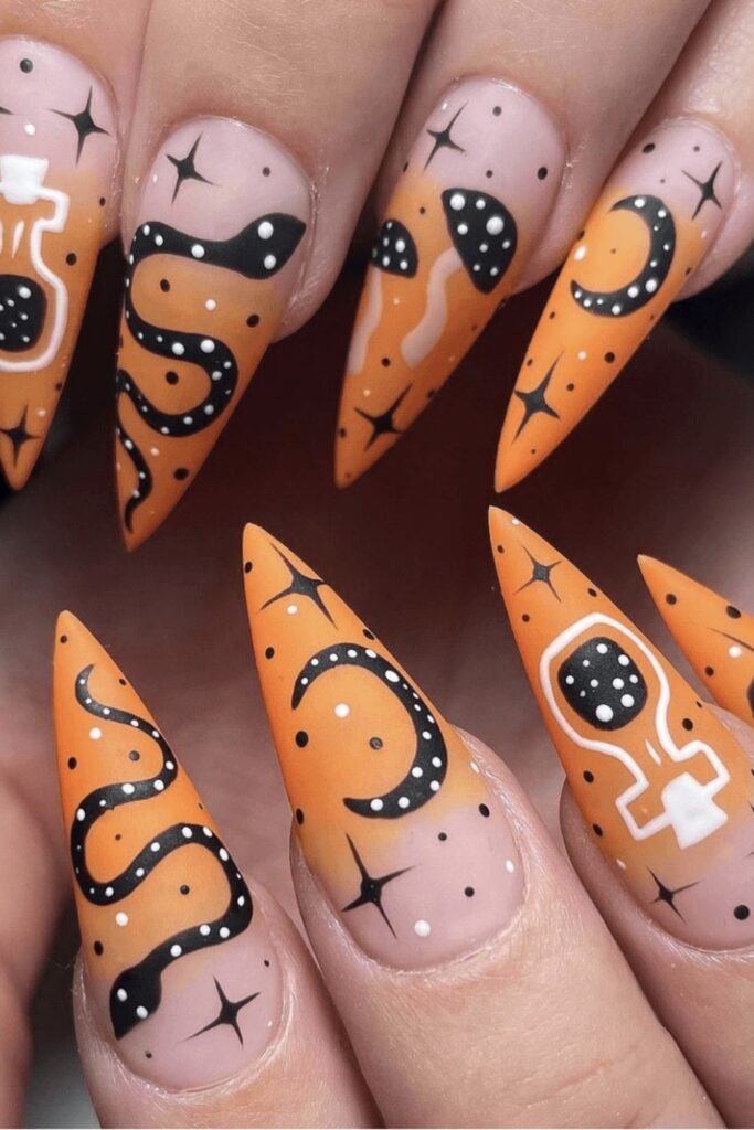 11. Orange Ombre Potion, Snake, and Moon Stilettos