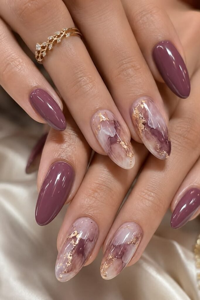 5. Mauve Marble Nails with Gold Foil