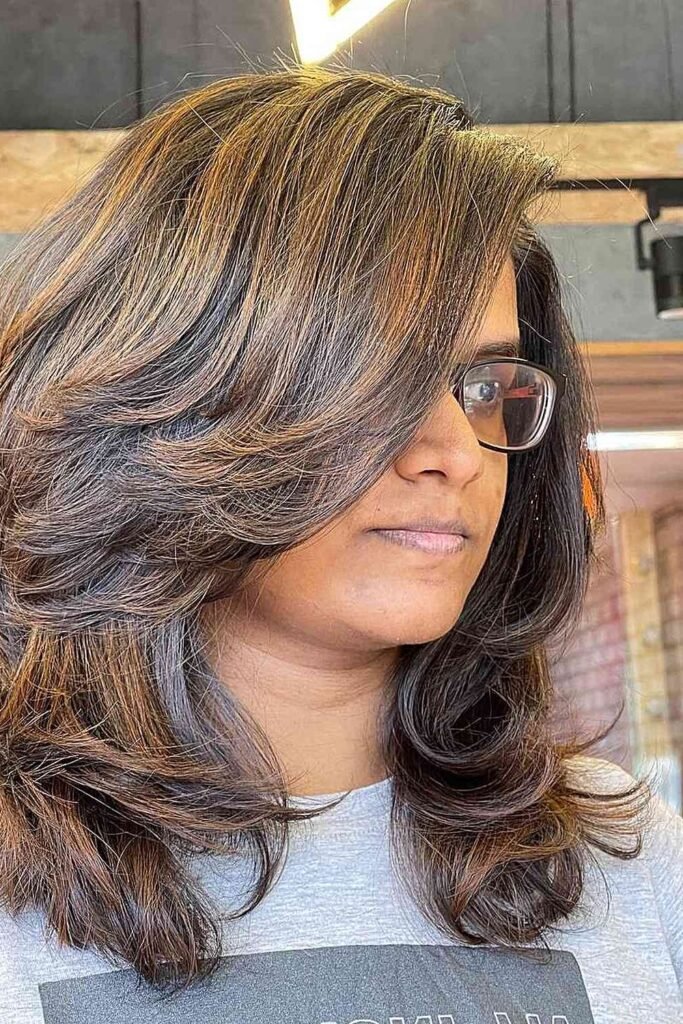 3. (Feathered Copper Highlights with Side Swept Bangs)