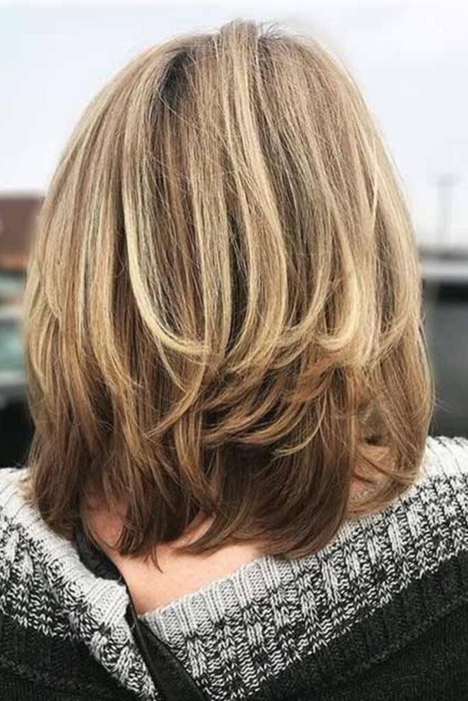 6. (Stacked Medium Layers with Blonde Highlights)