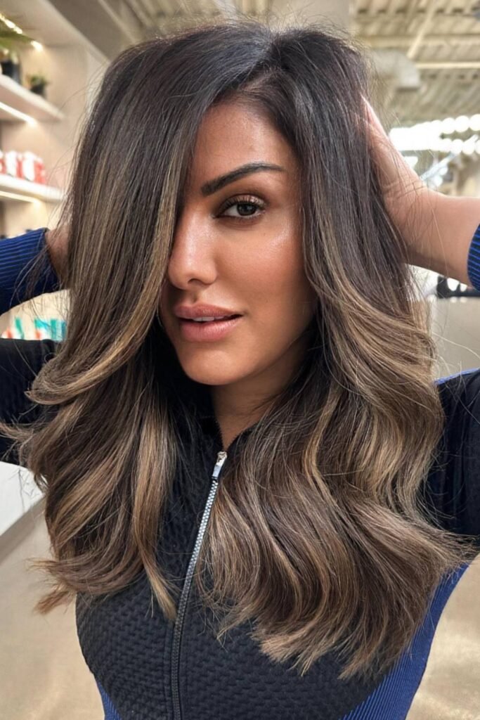 18. (Layered Balayage with a Side Swept Bang)