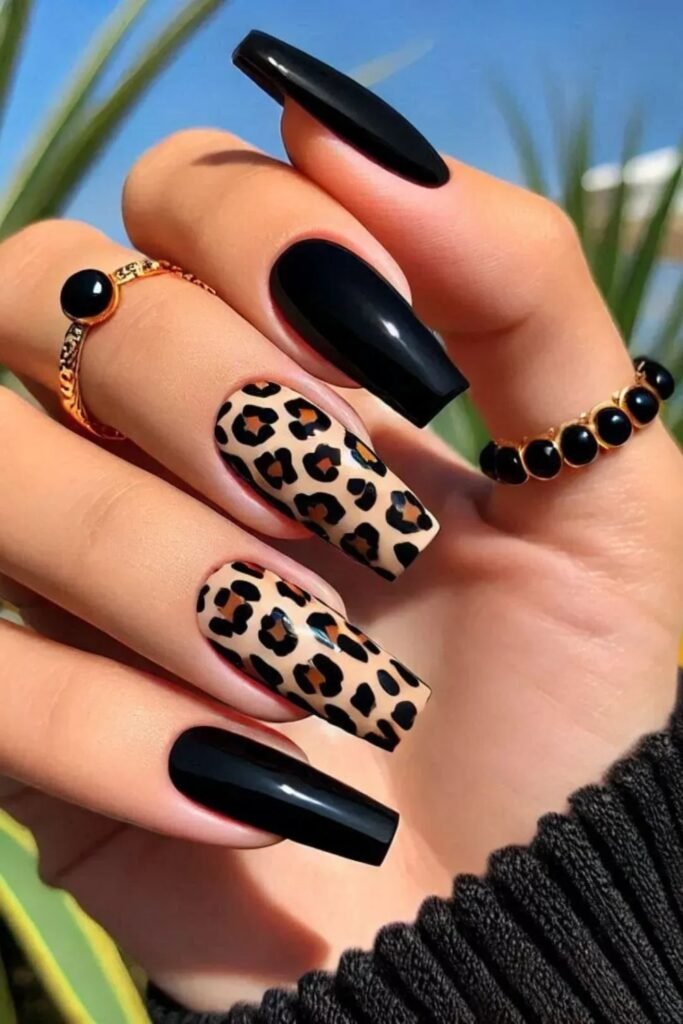 12. Black Coffin Nails with Leopard Accents