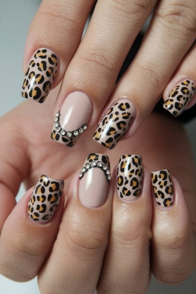14. Short Nude Leopard Nails with Rhinestone Chevron
