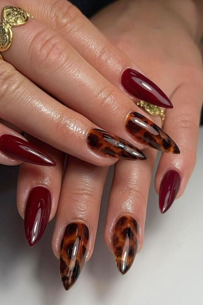 20. Burgundy and Tortoiseshell Leopard Jelly Stiletto Nails