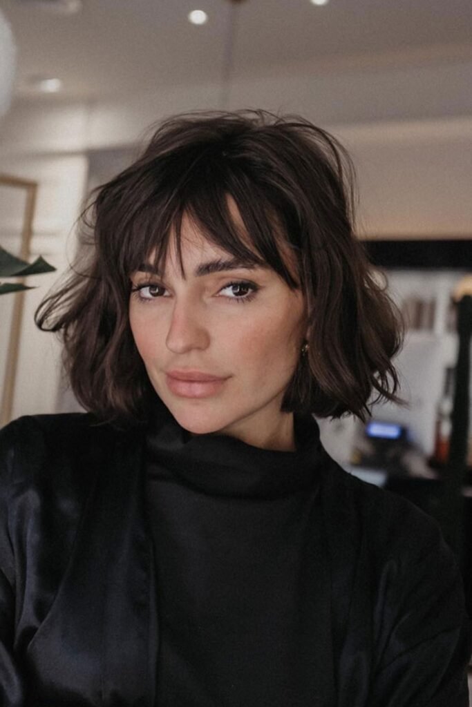 2. (Tousled French Bob with Wispy Bangs)