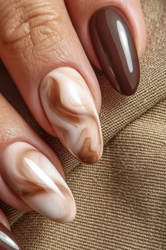 10. Latte Marble Swirl Nails