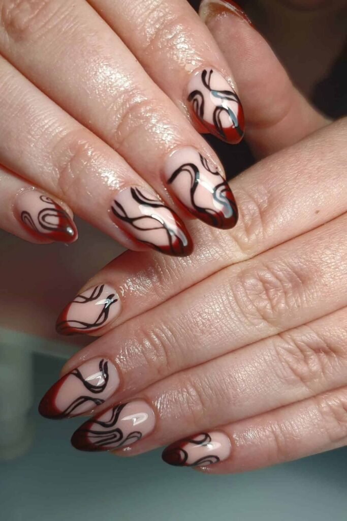 15. Black Swirl Line Art with Brown-Red Tips