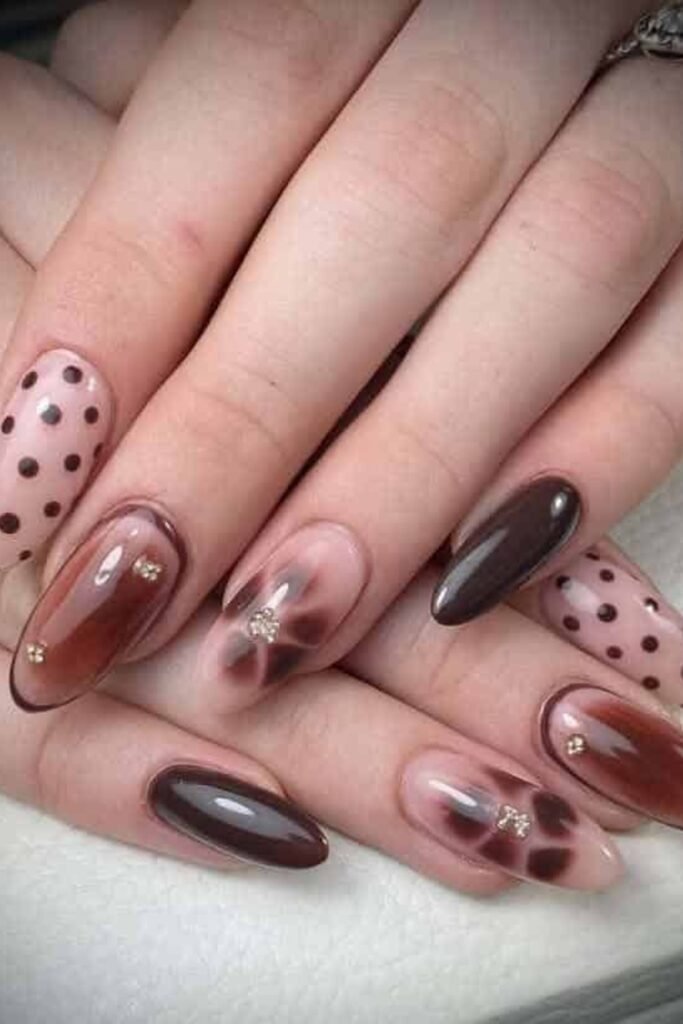 18. Brown Aura Nails with Dots and Gems