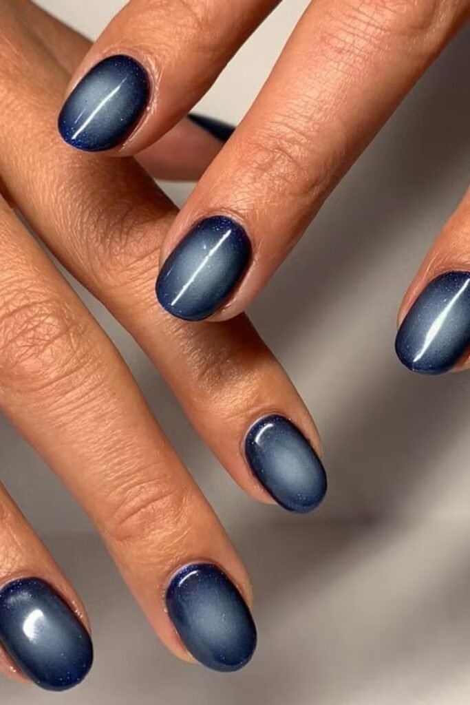 8. Navy Aura Cat-Eye Nails