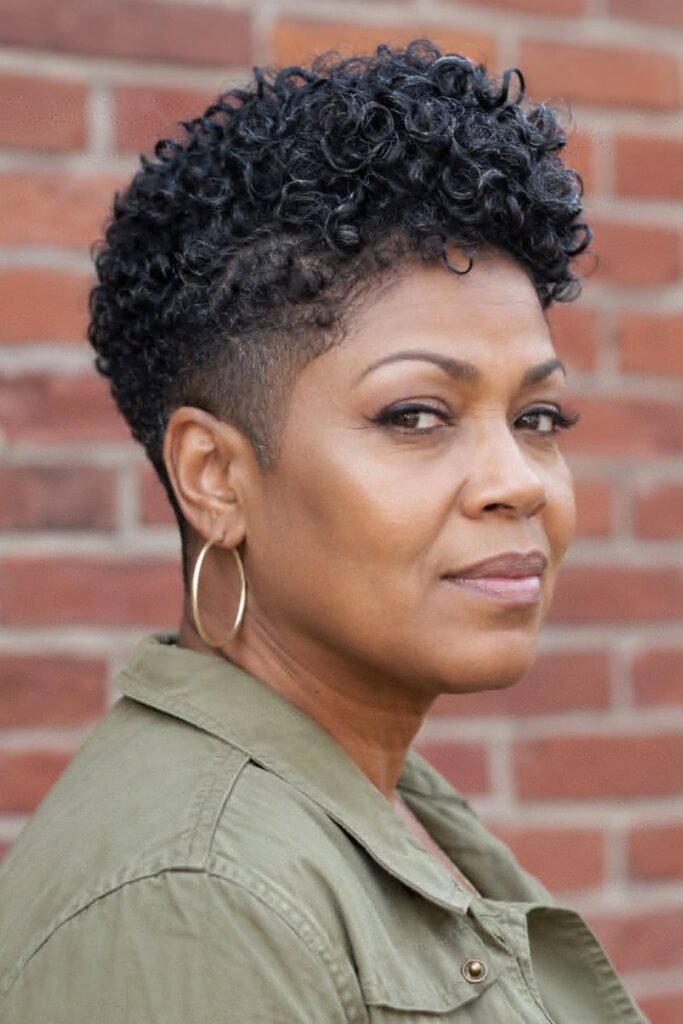 1. (Curly Tapered Mohawk with Faded Sides)