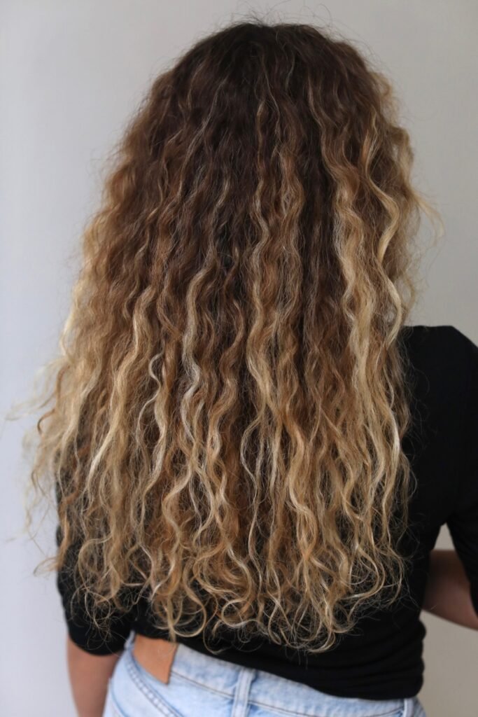 6. Sun-Kissed Brown to Golden Blonde Waves