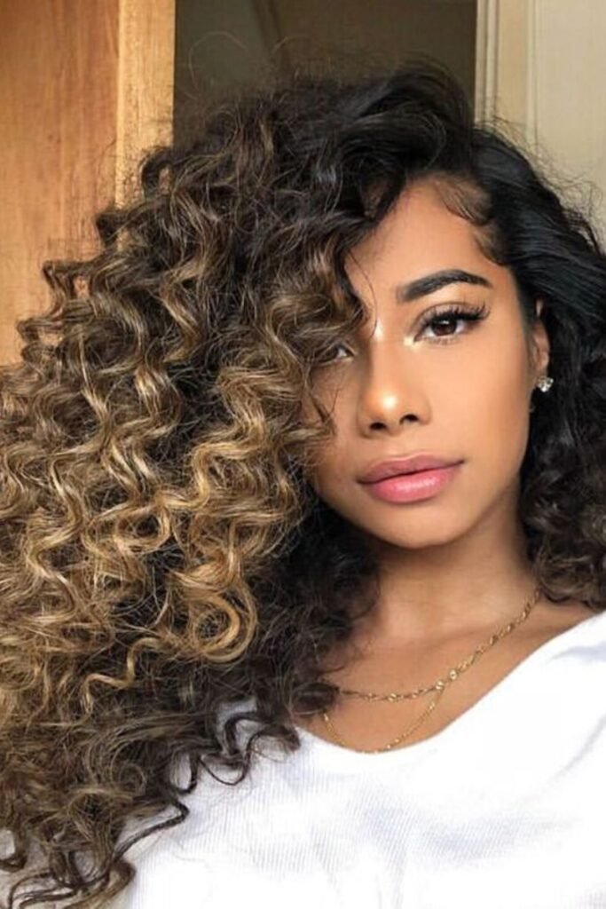 11. Black to Bronze Balayage Curls