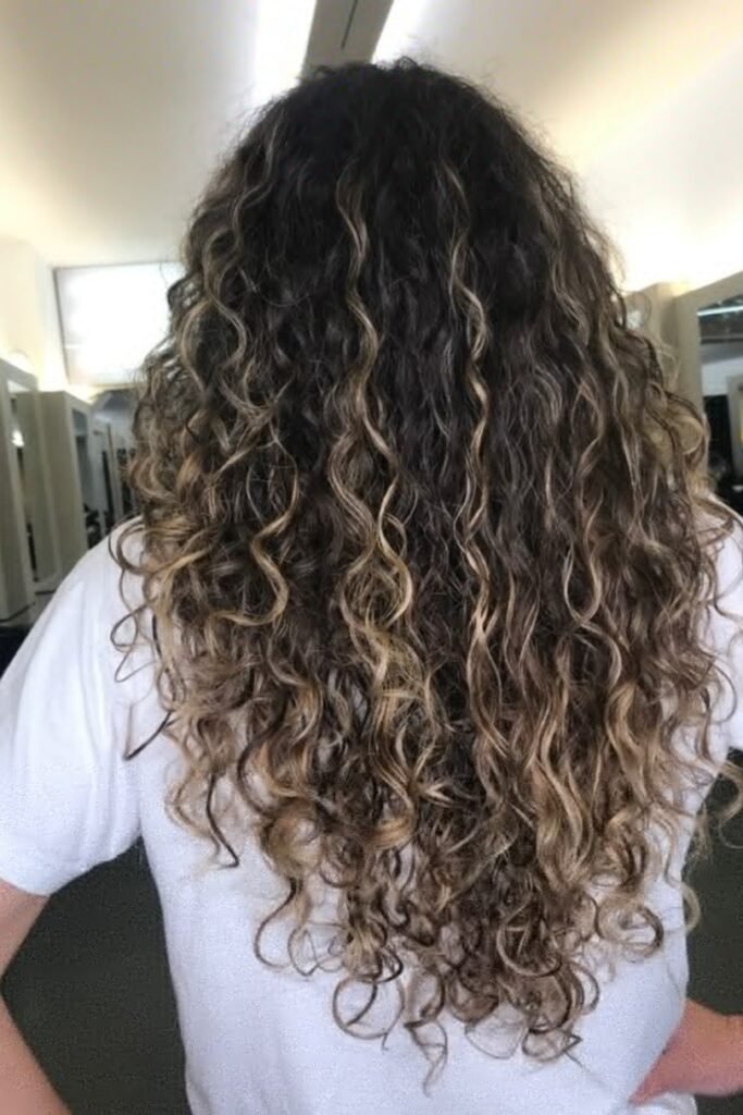 17. Dark Brown Curls With Blonde Ribbons